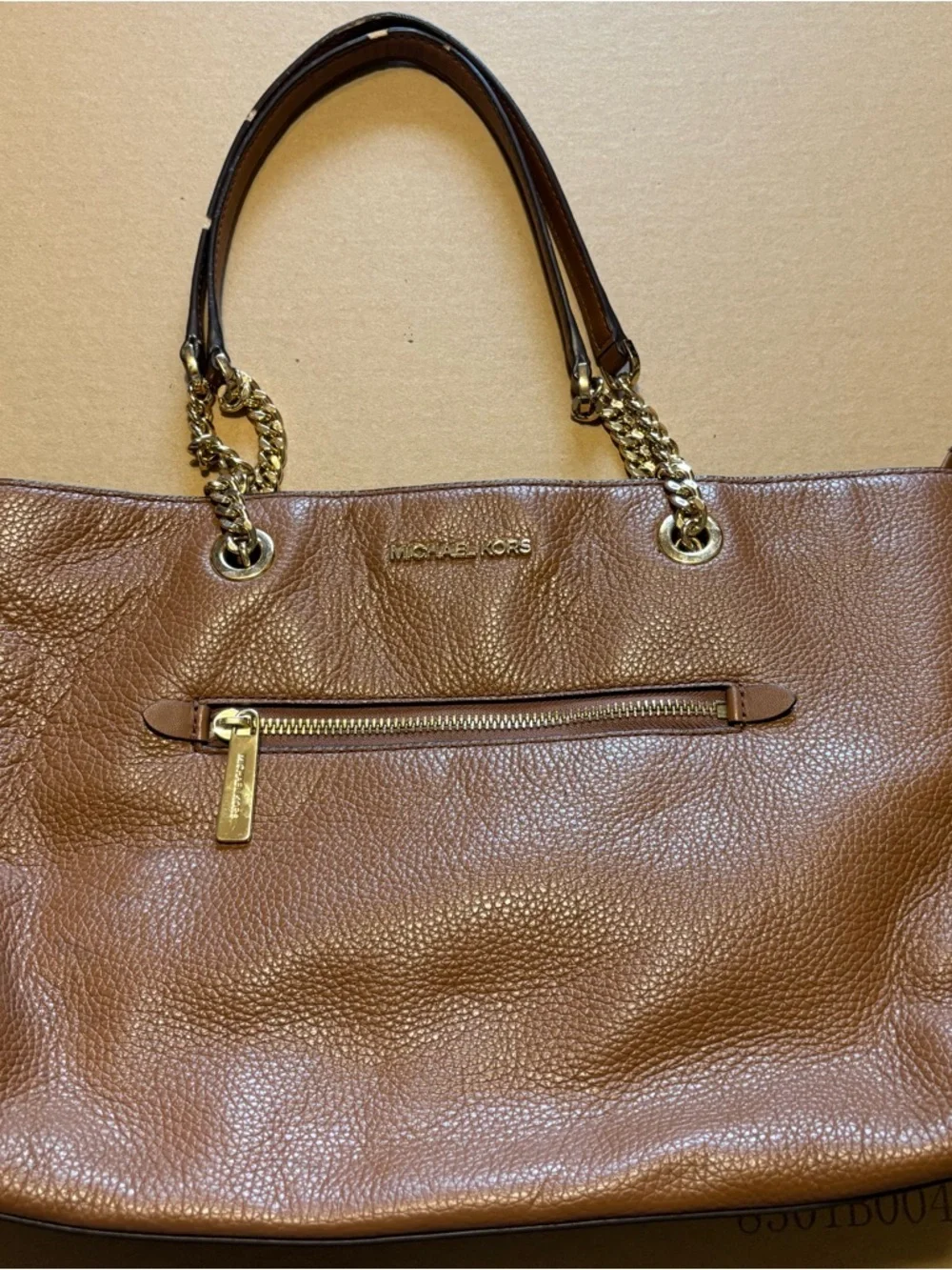 Michael Kors Cognac Pebbled Leather Tote with Gold Chain Straps zipper closure